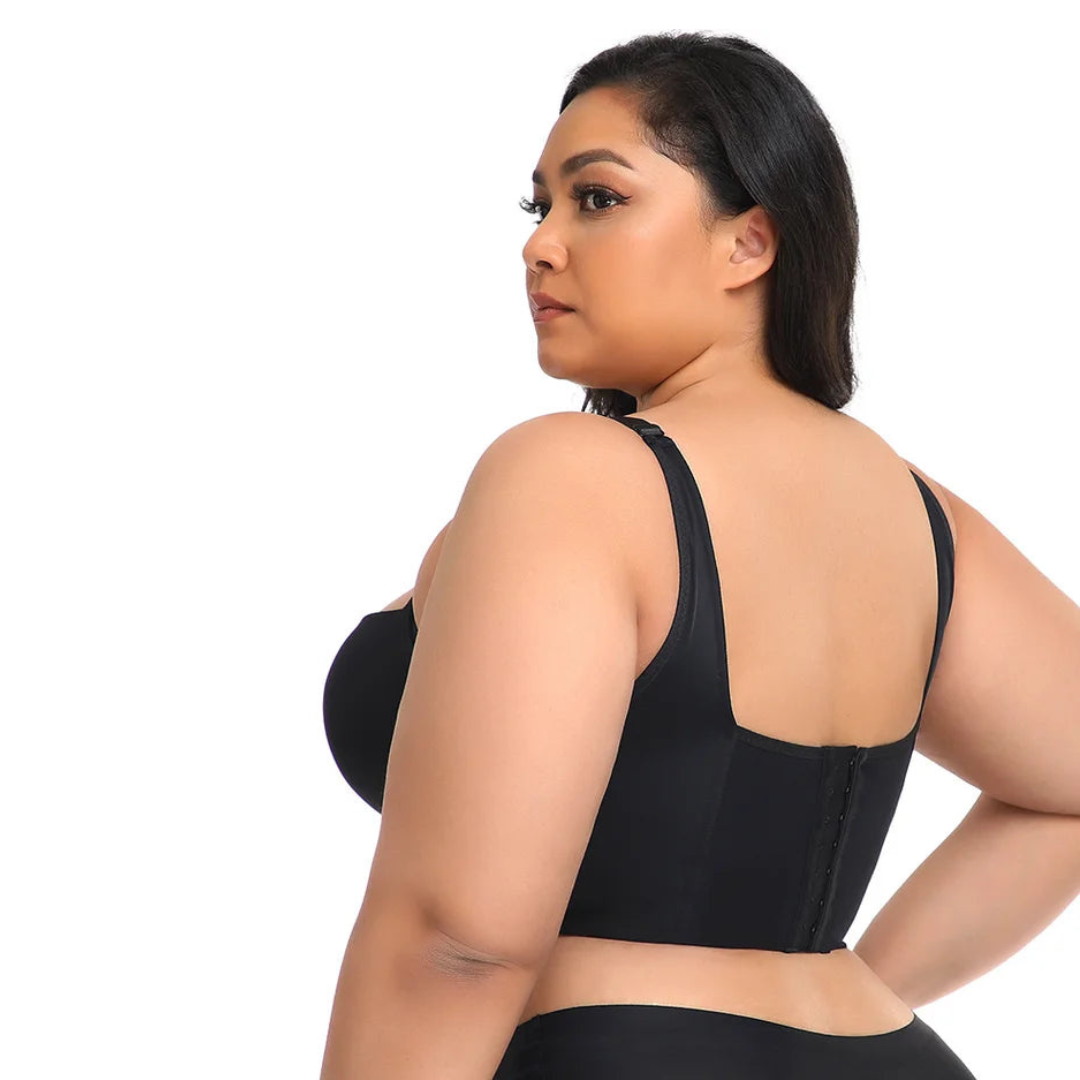 Back view of a plus-size woman wearing a black push-up shaping bra, highlighting smooth support and comfort.