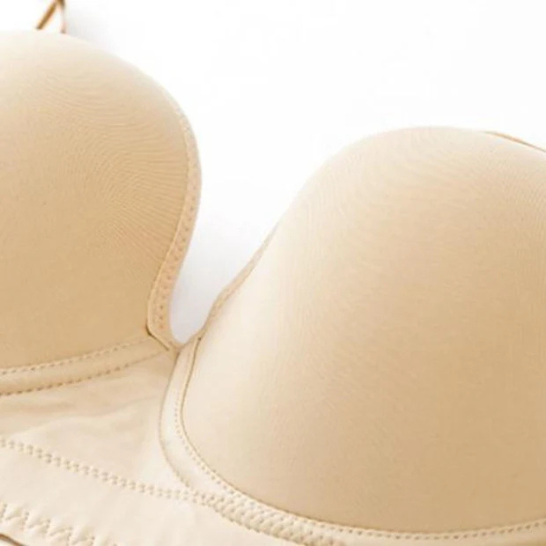 Close-up of a nude push-up bra showcasing seamless cups for flattering lift and smooth support.